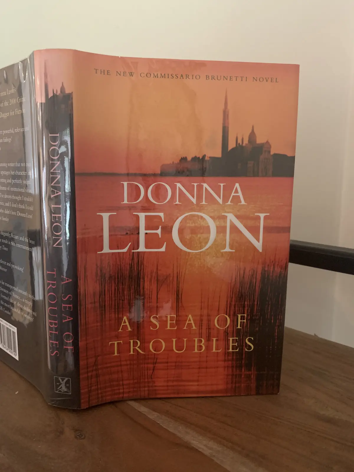 [Signed] [First Edition] A Sea of Troubles (signed) Leon