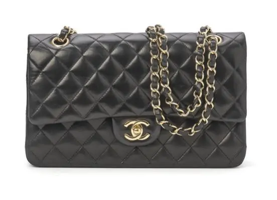 Chanel: A "Classic Double Flap" bag of black quilted lamb skin with