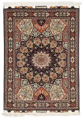A signed Tabriz carpet, Persia. Medallion design. Outlines with silk