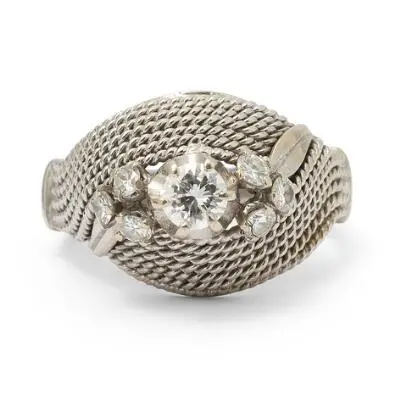 A diamond ring set with brilliant-cut diamonds, mounted in 10k white