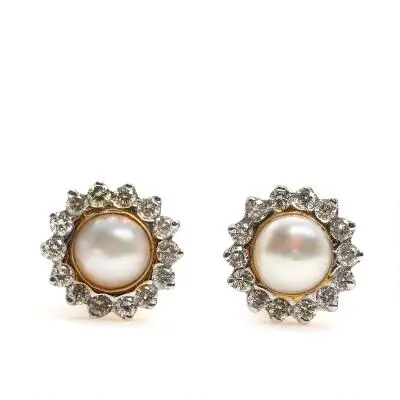 A pair of pearl and diamond ear rings each set with a pearl and brilliant-cut