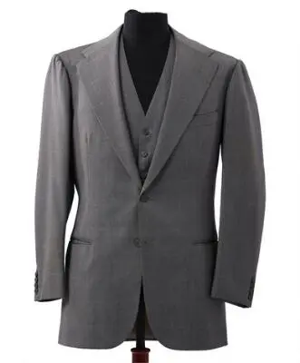 Alfred Alm: A grey jacket with matching waistcoat with a light blue