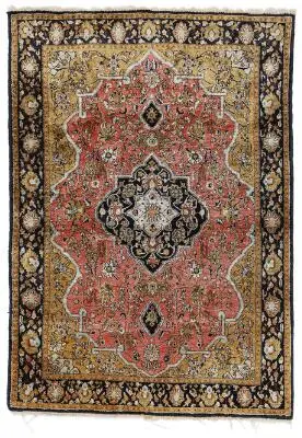 A Qum full silk rug, Persia. Maedallion design. 20th century. 156