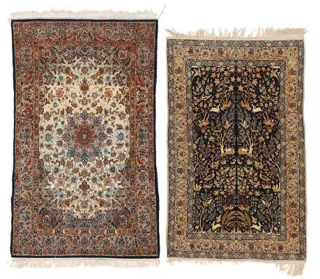 Two Isfahan rugs, Persia. Trees, flowers and animal motifs. Second