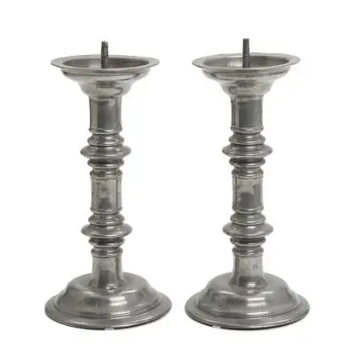 A pair of Baroque church candlesticks in tin, engraved with inscription