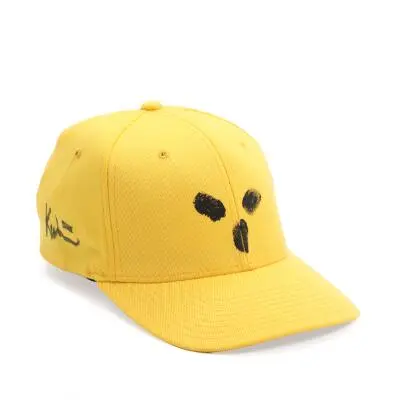 Michael Kvium: Fingerprint. Signed Kvium. A yellow coloured cap, decorated