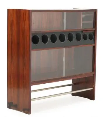 Poul Heltborg: A freestanding rosewood bar, top with black formica.