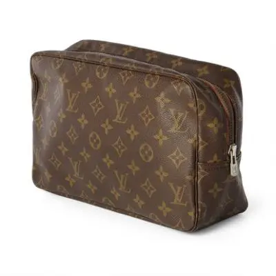 Louis Vuitton: A "Trousse Toilette 28" of brown monogram canvas with