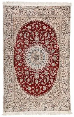 A signed Nain rug, Persia. Medallion design. C. 1.2 mio. kn. pr. sqm.