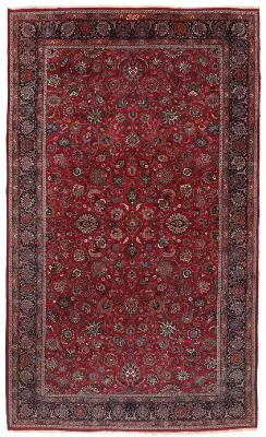 A signed Amal Barandaran Dorokhshy Mashad carpet, Persia. Highly decorative