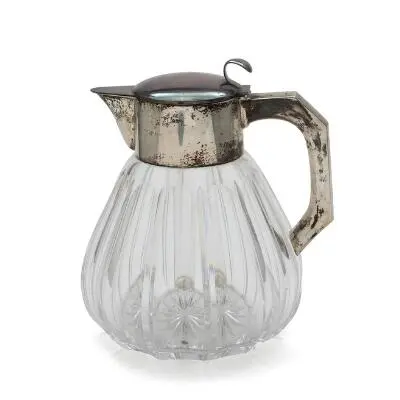 A German cut glass pitcher with silver mounting, interior with glass