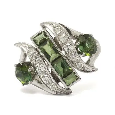 A tourmaline and diamond ring set with faceted tourmalines and diamonds