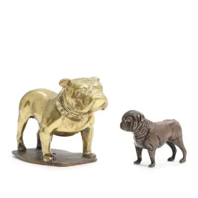 English silver pincushion and figure of bronze in the form of a standing