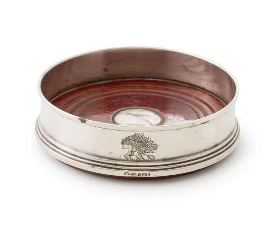 An Elizabeth II sterling silver wine coaster, W I Broadway & Co, 2000