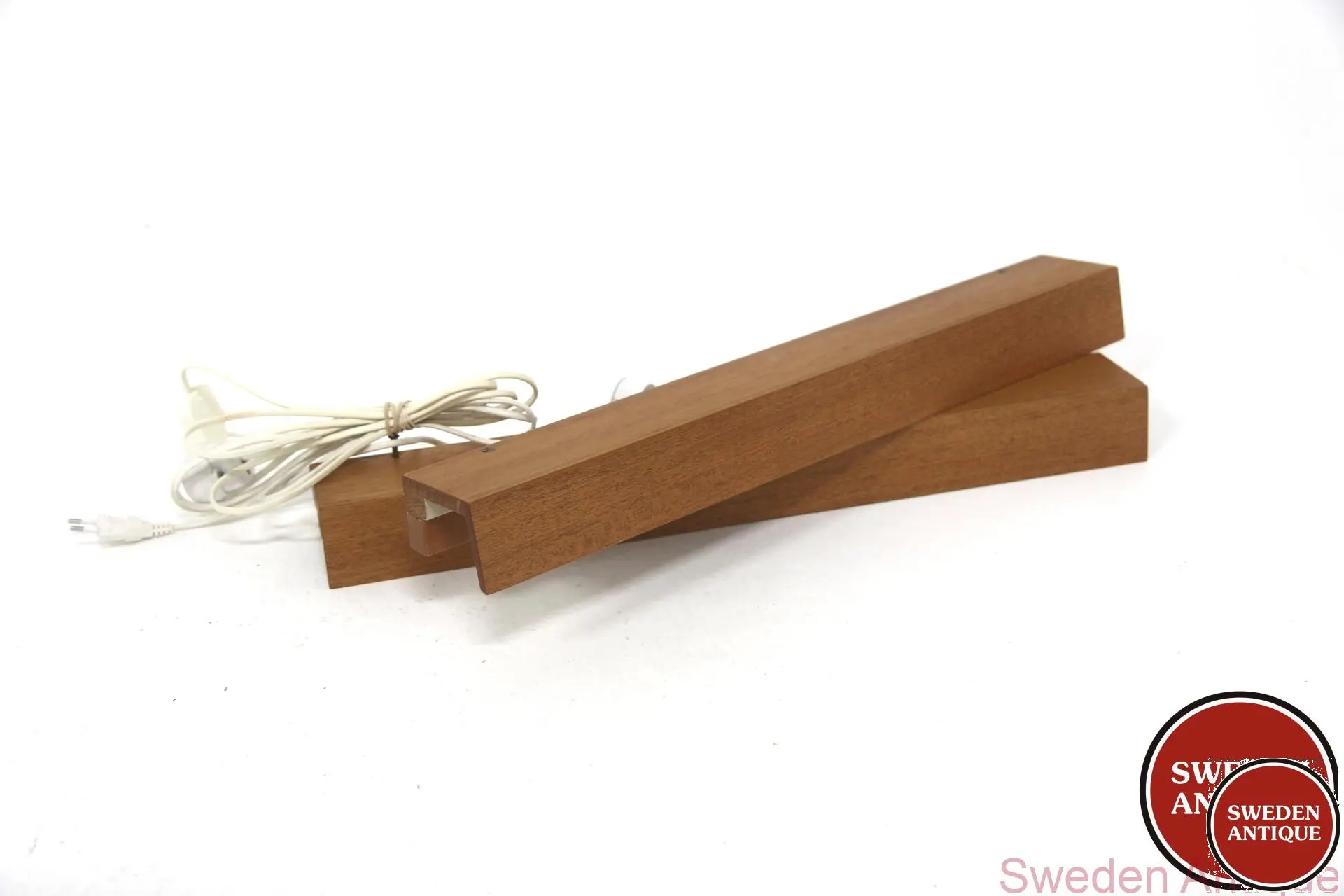 2Pcs Lamps / Light rails Year: 1960s Origin: Swe. Material: Teak W: