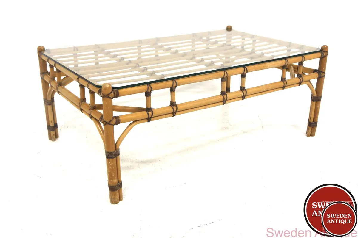 Coffee table Year: 1970s Origin: Swe. Material: Rattan Glass W: 130cm