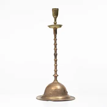 A presumably Flemish 17th century baroque candlestick incorporating