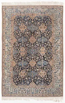 A semi-antique Nain carpet, part-silk, c. 261 x 175 cm.