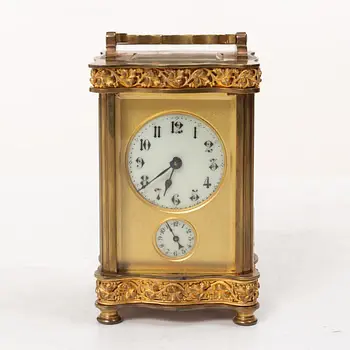 A French gilt-bronze striking carriage clock, late 19th century.