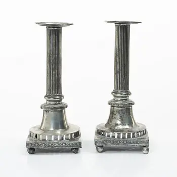 A pair of peuter candlesticks by Hans Wicksten (active between 1782-1810)