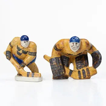Lisa Larson, Two figurines, ice hockey players, stoneware, Gustavsberg.