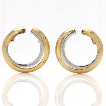 Ole Lynggaard, 18K gold and diamond hoop earrings.