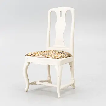 A Rococo chair, 18th century.