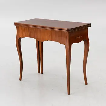 A Rococo game table, 18th century.