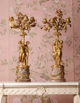 A PAIR OF FRENCH ORMOLU FOUR BRANCH CANDELABRA, IN THE MANNER OF FALCONET