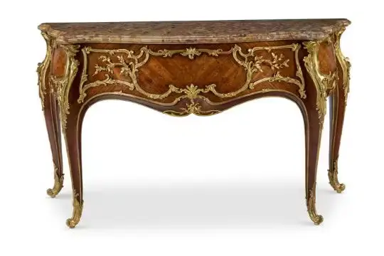 ‡ A FRENCH ORMOLU-MOUNTED KINGWOOD, PADOUK AND MARQUETRY BOMBE COMMODE