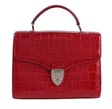 Y ASPINAL OF LONDON, A RED CROCODILE HANDBAG