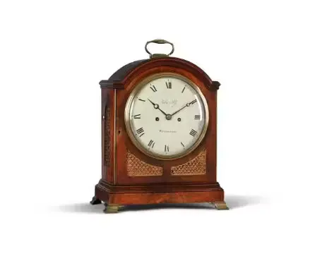 A GEORGE III/REGENCY BRASS MOUNTED MAHOGANY BRACKET CLOCK