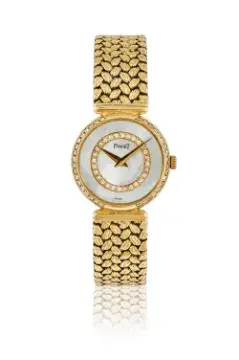 Y PIAGET, REF. 8055 D2 X, A LADY'S 18 CARAT GOLD AND DIAMOND BRACELET WATCH