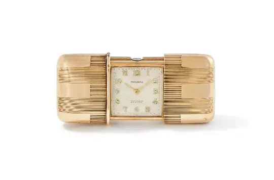MOVADO, A 9 CARAT GOLD PURSE WATCH