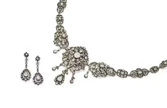 A. J ROUS, A DIAMOND NECKLACE AND EARRINGS