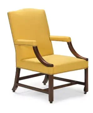 A GEORGE III MAHOGANY AND YELLOW UPHOLSTERED GAINSBOROUGH ARMCHAIR, CIRCA 1780