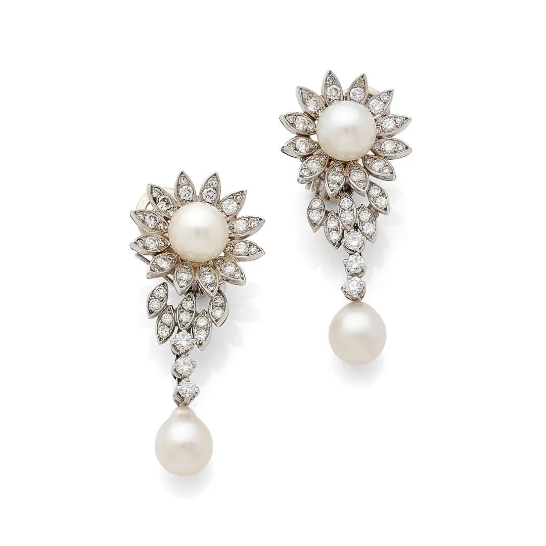 MELLERIO, A pair of ‘Day & Night’ earrings