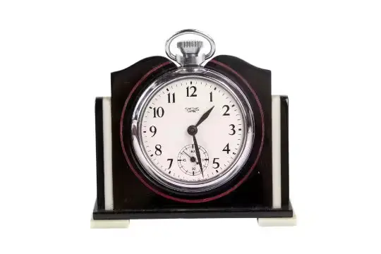A mid-century Smiths Empire mounted pocket watch clock.