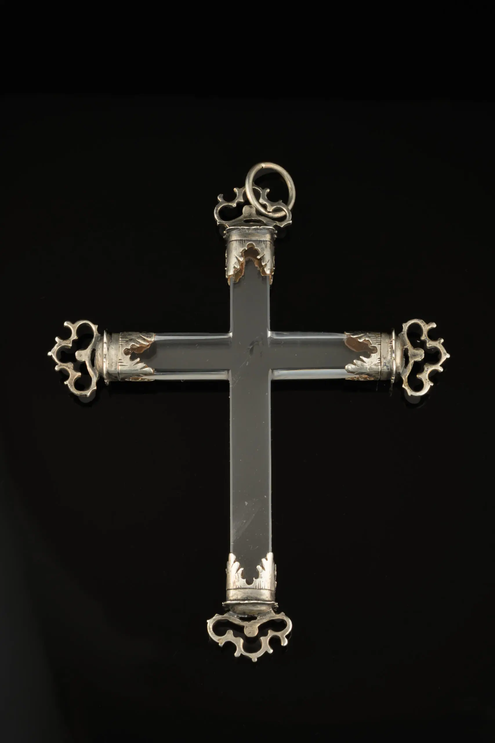A fine rock crystal crucifix with silver mounts; Spanish, 17th century