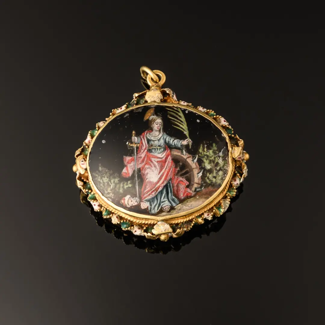 A devotional pendant, rock crystal mounted with gold decorated with