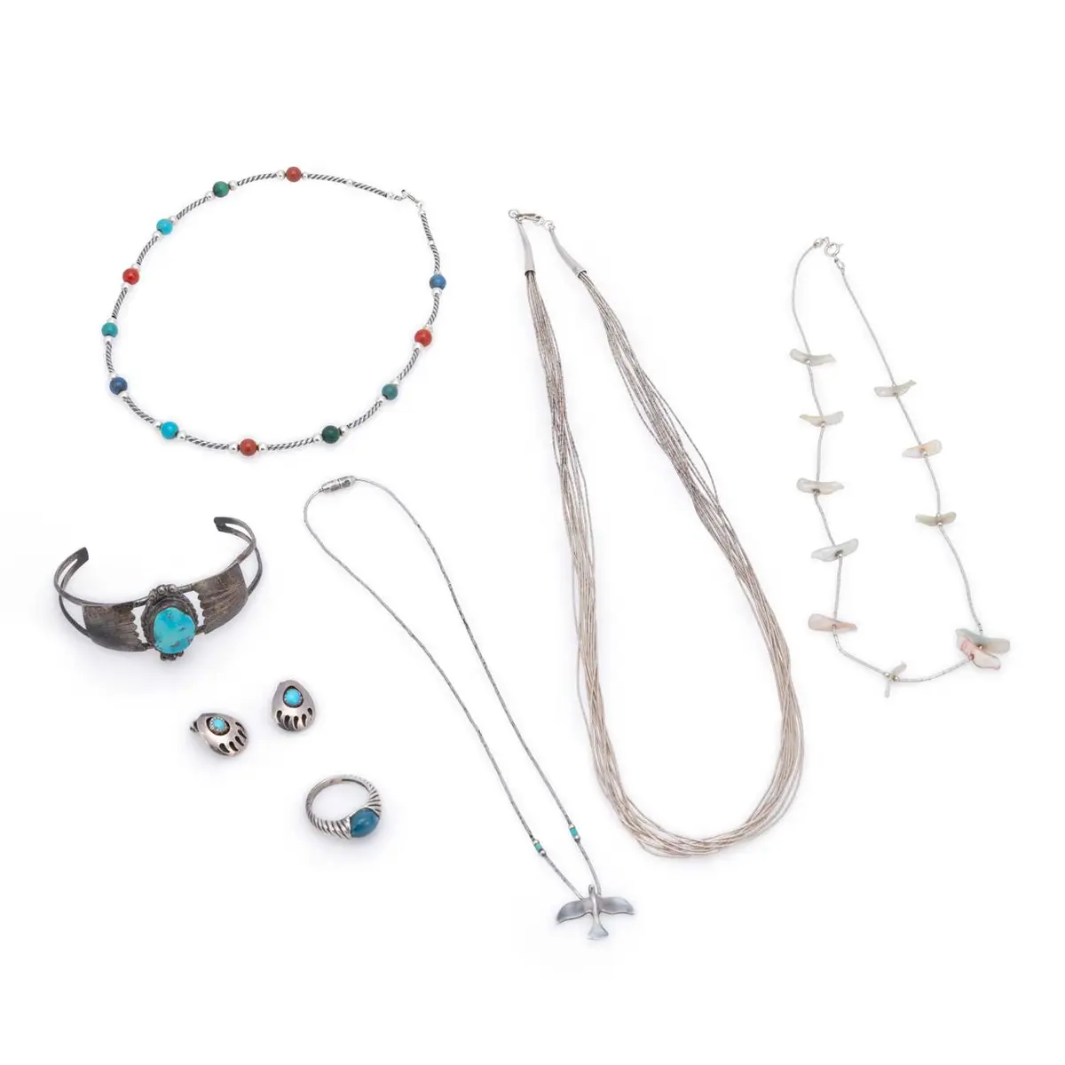A COLLECTION OF NATIVE AMERICAN NAVAJO SILVER JEWELLERY