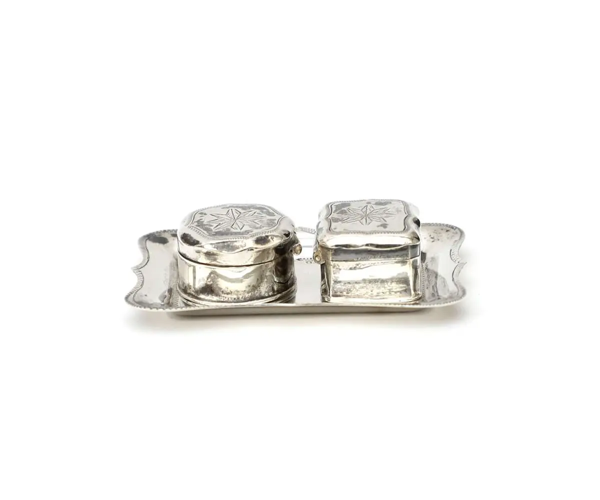 Two miniature silver biscuit tins on a tray, the Netherlands, Sneek