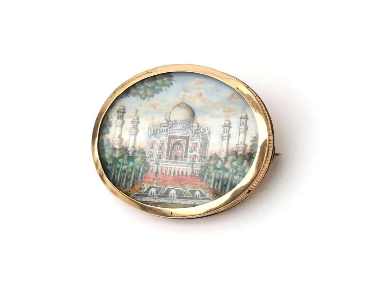 A 14k yellow gold and silver brooch