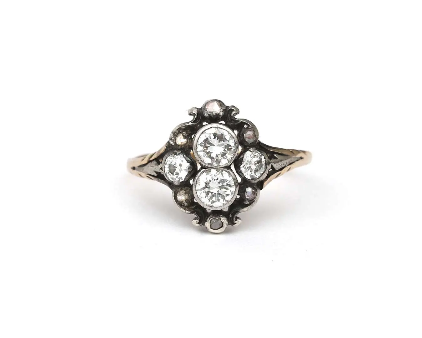 A 14-carat yellow gold and silver ring set with a diamond, late 19th century