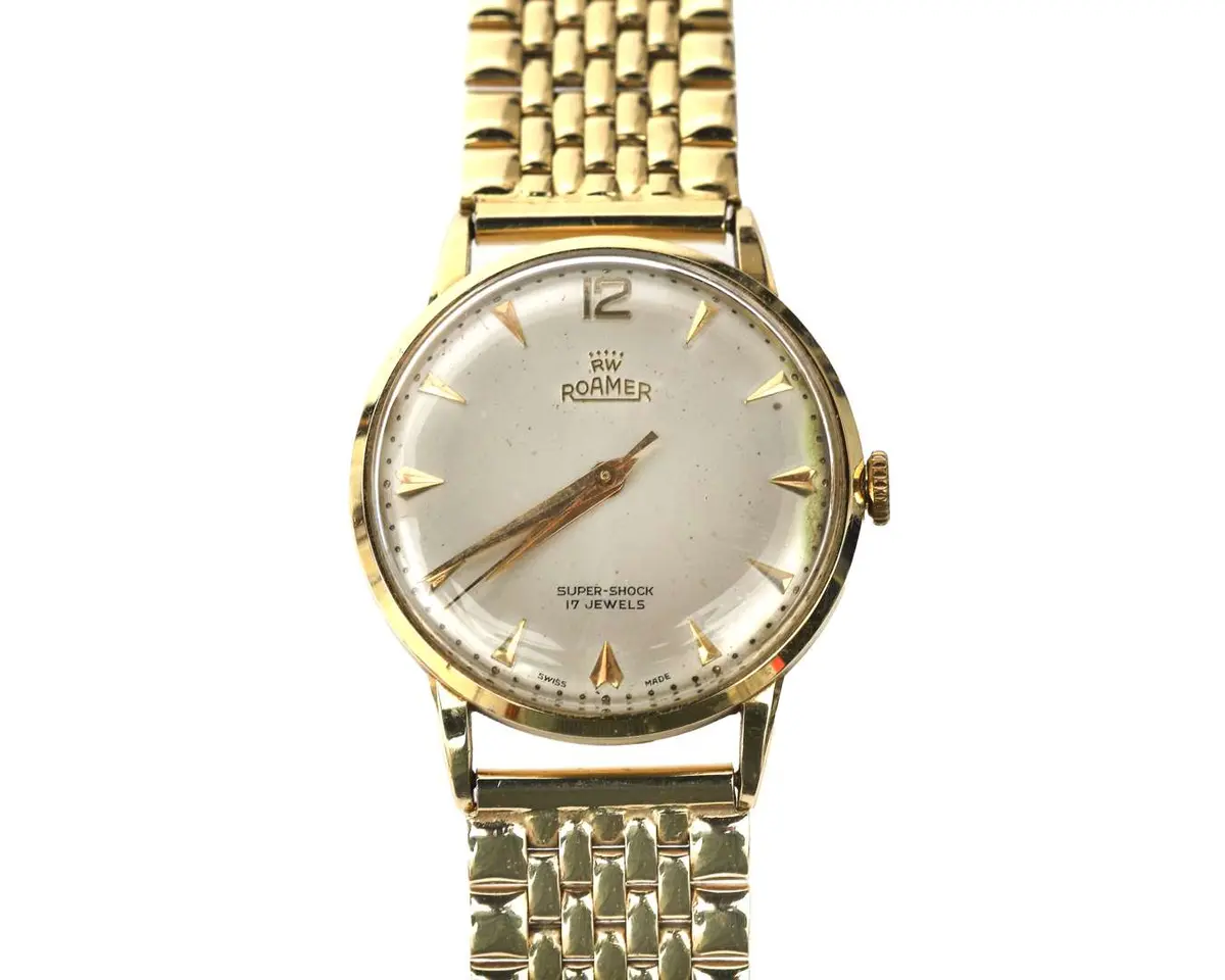 A 14k yellow gold men’s wristwatch, made by Roamer, from the 1970s