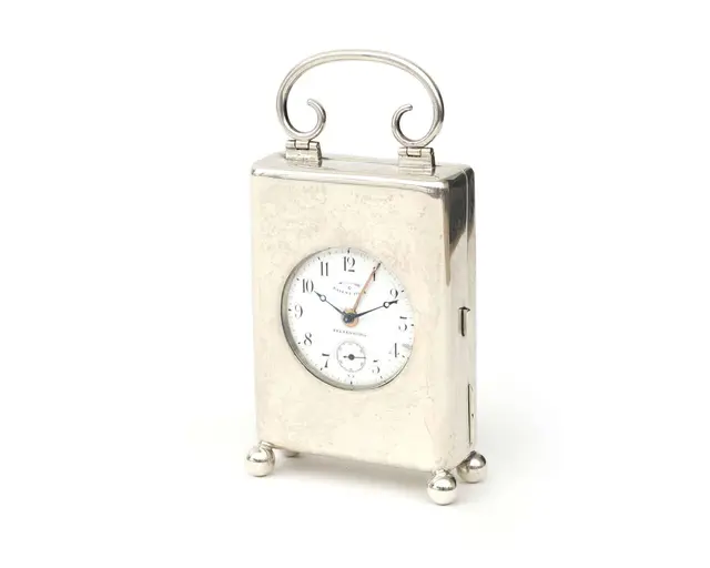 A silver watch case containing a metal pocket watch, Germany, Dresden