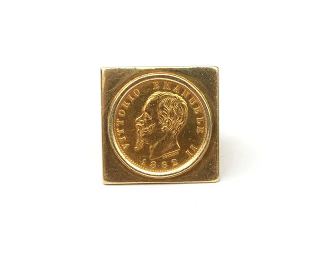 A 14k yellow gold ring featuring a coin of Vittorio Emanuele