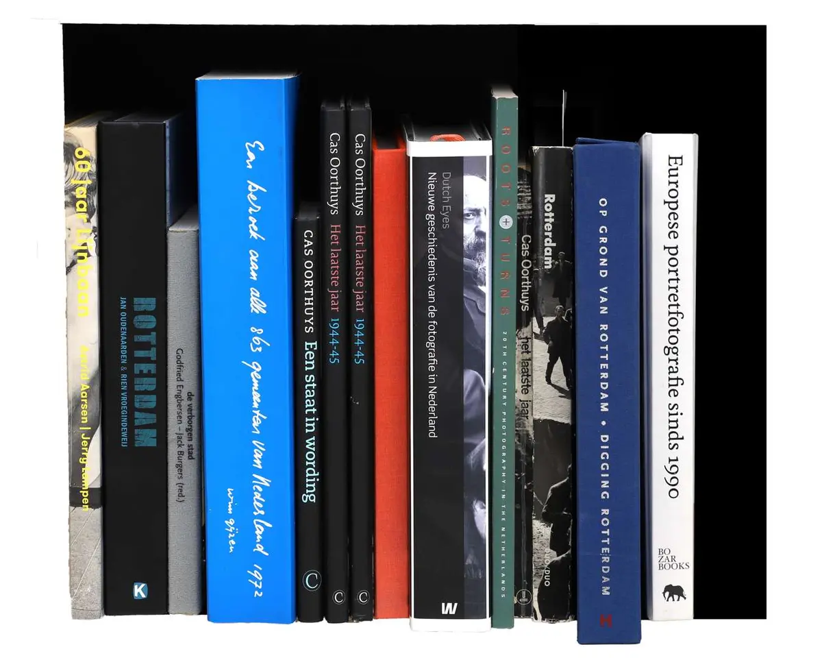 A collection of 13 photography books, including a collection of books