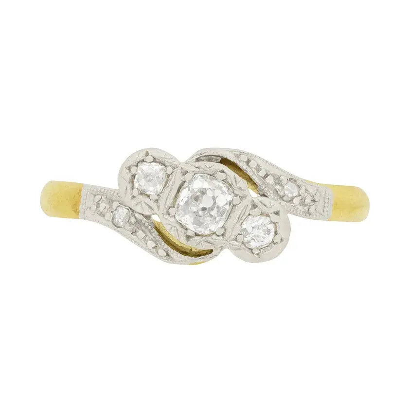 Edwardian 0.25ct Diamond Three Stone Crossover Ring, c.1910s
