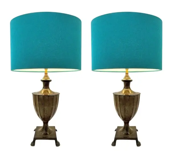 A pair of 1970s classical cast bronze lamps with verdigris finish and paw feet